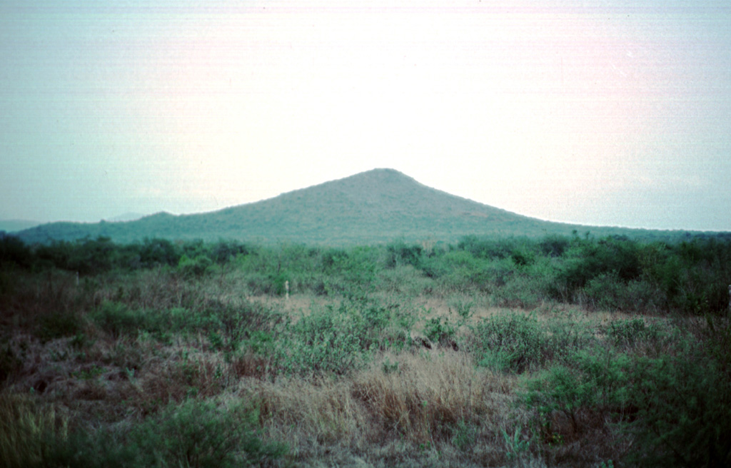 The 200-m-high Cerro la Pitahaya pyroclastic cone is seen from the SSE near the town of Francisco Madera.  It is one of many cinder cones of the Aldama volcanic field along the coastal plain near the Gulf of Mexico. Photo by Jim Luhr, 2000 (Smithsonian Institution).