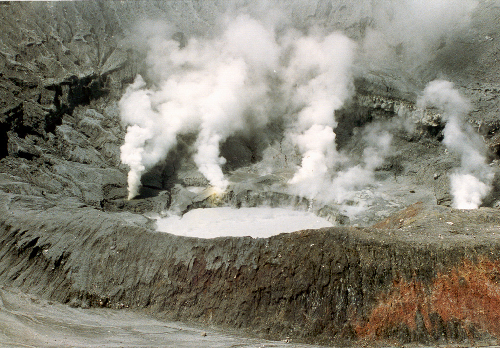 Minor phreatic eruptions ejecting material to heights of several meters were reported in March 1994. Two more phreatic eruptions were reported at the end of April, by which time the crater lake was nearly gone. Intense gas emission in the ensuing months caused health problems and severe economic losses in agricultural areas. Eruptions producing ash plumes that took place on 3 June and 9 July-5 August formed a small new crater. The crater lake (seen here 2 September 1994) returned, and minor phreatic eruptions occurred in October.  Photo by José Enrique Valverde Sanabria, 1994 (courtesy of Eduardo Malavassi, OVSICORA-UNA).