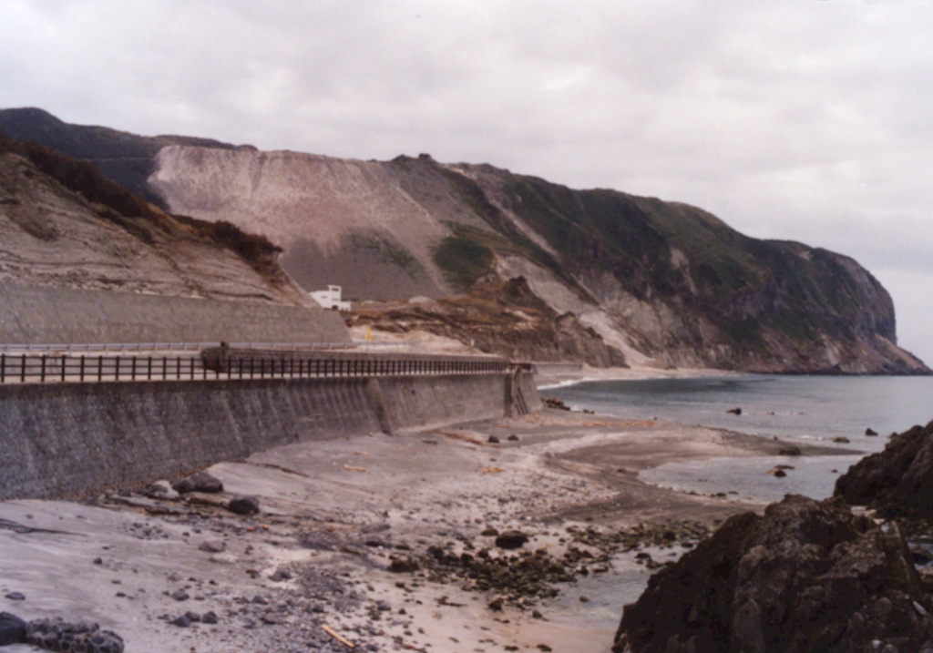 The Mukaiyama lava dome lies at the southern end of the island of Niijima. It formed during a single eruption in July 886 CE beginning in shallow water with the formation of a tuff ring from repeated base surges, followed by a pyroclastic cone and lava domes.  Photo by Ichio Moriya (Kanazawa University).