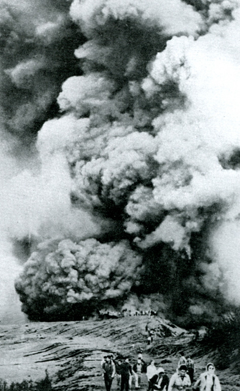 This 1964 photo shows visitors at the edge of the Irazú active crater; seven people were killed and many more injured by explosive ejecta in April and August of that year. Secondary lahars produced by the remobilization of thick ash deposits also caused fatalities. Over a 2-year period, 46 lahars occurred along the Río Reventado valley; one killed at least 20 people and destroyed 400 houses and some factories. Anonymous, 1964 (published in Alvarado, 1989).