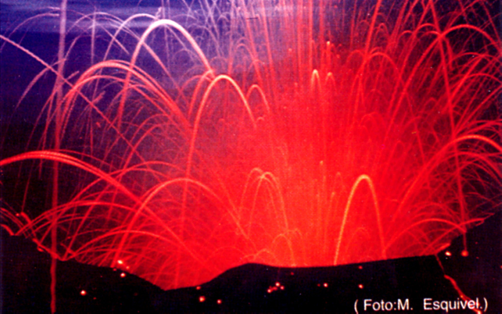 Strombolian explosions during the 1963-65 eruption ejected incandescent lava bombs from the crater, seen here in a time-lapse photo. Similar activity occurred in December 1963 and January 1964. Photo by M. Esquivel (published in Barquero, 1998).