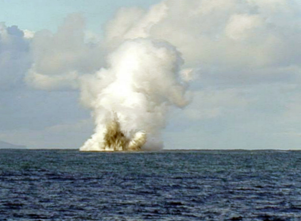 An explosive eruption from Kavachi volcano was seen from the Australian CSIRO research vessel Franklin on 14 May 2000. During their 20 hours of observations explosions were witnessed every 5-7 minutes, lasting 2-3 minutes each. The crater was estimated at 2-5 m below the water surface. The eruptions ejected ash and incandescent lava up to 70 m above the sea surface, and plumes rose to heights of 500 m. Kavachi had been erupting intermittently since November 1999. Photo by Australian Commonwealth Scientific and Industrial Organization (CSIRO), 2000.