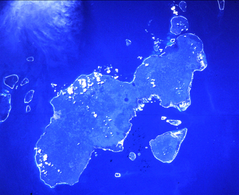 The dumbbell-shaped, E-W-trending Jolo island contains numerous pyroclastic cones and craters, some of which are visible in this Space Shuttle image with north to the upper left.  The island is about 60 km wide in an E-W direction; its largest city, Jolo, lies on the northern coast (left-center).  The isolated location of Jolo at the SW end of the Philippines archipelago as well as political unrest have inhibited geological studies of the volcano.  NASA Space Shuttle image STS50-99-94, 1992 (http://eol.jsc.nasa.gov/).