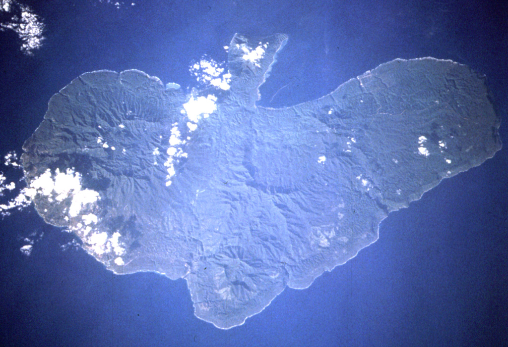 The peninsula at the top of this Space Shuttle image of Erromango Island (N is approximately to the left) is the Traitor's Head Peninsula. Three Holocene cones at Traitor's Head are the youngest on the 50-km-long island. The volcanoes initially formed an offshore island that later joined the mainland through uplift. The only documented activity at Erromango was a submarine vent that erupted in 1881. NASA Space Shuttle image STS68-220-4, 1994 (http://eol.jsc.nasa.gov/).