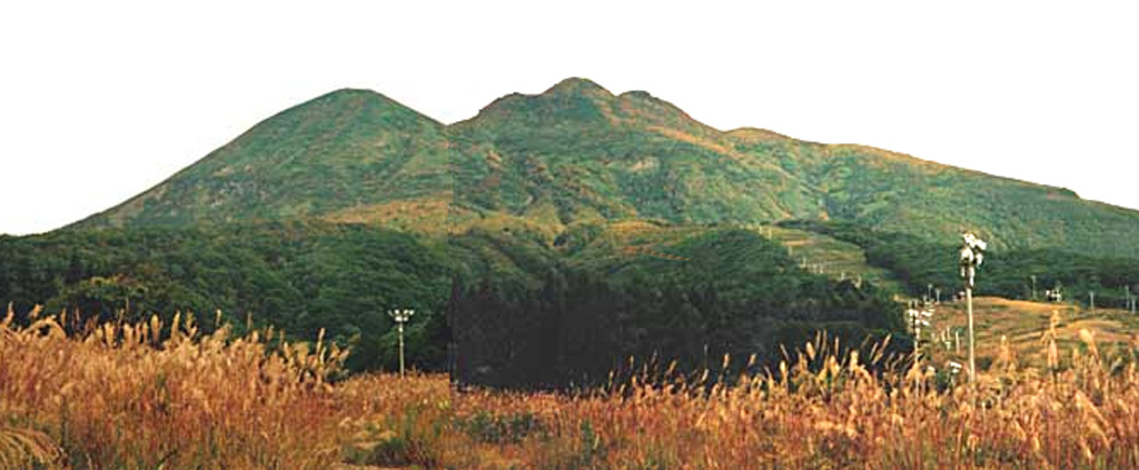 The irregular summit lava dome in the Iwakisan central crater forms the high point in this view from the SE, and has six craters on the flanks. Chokaisan is the rounded peak to the left. Debris avalanche deposits from repeated summit and flank collapse surround the volcano on all sides. Eruptions have been recorded since 1597 CE and have primarily been small-to-moderate phreatic explosions. Copyrighted photo by Shingo Takeuchi (Japanese Quaternary Volcanoes database, RIODB, http://riodb02.ibase.aist.go.jp/strata/VOL_JP/EN/index.htm and Geol Surv Japan, AIST, http://www.gsj.jp/).