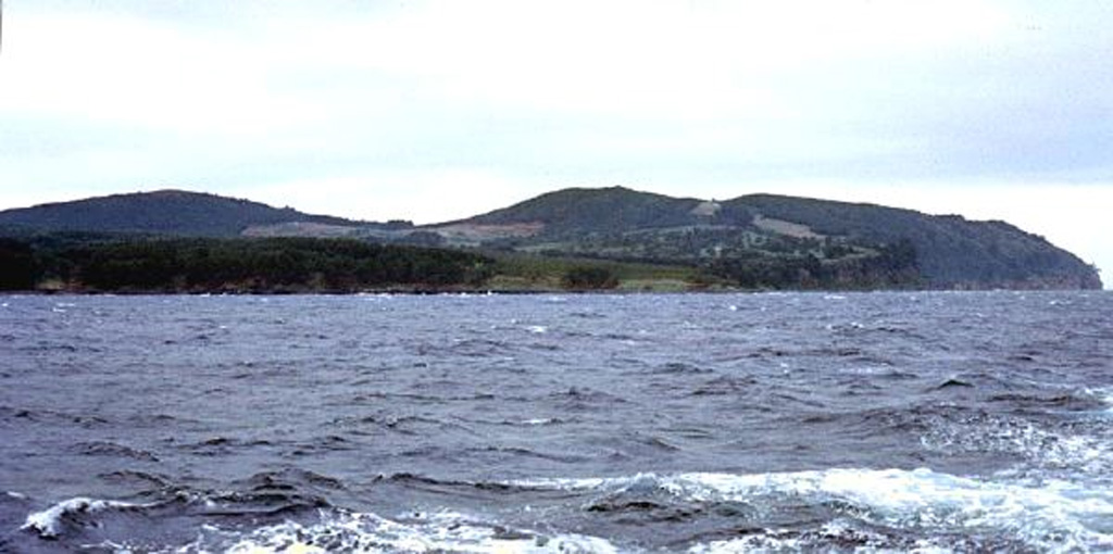 Maruyama cone is the low-angle peak at the left and Odokoyama on the right in this offshore view of Oki-Dogo Island. The Oki-Dogo Islands, north of the SW Honshu city of Matsue, are largely Pleistocene in age. The Daimanjisan lava flow on Oki-Dogo overlies alluvial gravel containing an ancient water jar, and the name Takuhiyama ("Burning Mountain") may reflect an oral record of an eruption. Copyrighted photo by Tadahide Ui (Japanese Quaternary Volcanoes database, RIODB, http://riodb02.ibase.aist.go.jp/strata/VOL_JP/EN/index.htm and Geol Surv Japan, AIST, http://www.gsj.jp/).