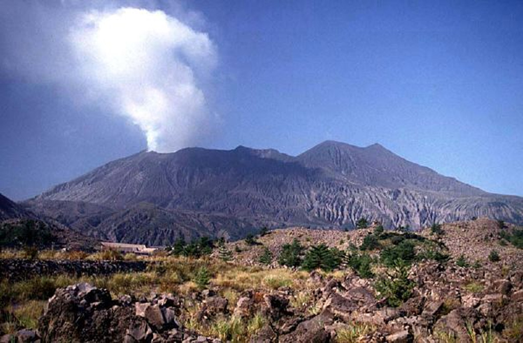 A plume rises above the Minamidake crater on Sakurajima. Activity at Kitadake, the peak to the right in this view from the SE, ended about 4,850 years ago, after which eruptions took place at Minamidake. Sakurajima is one of Japan's most active volcanoes and is a post-caldera cone in the Aira caldera at the northern half of Kagoshima Bay. Frequent historical eruptions have deposited ash across the bay on Kagoshima, one of Kyushu's largest cities. Copyrighted photo by Shun Nakano (Japanese Quaternary Volcanoes database, RIODB, http://riodb02.ibase.aist.go.jp/strata/VOL_JP/EN/index.htm and Geol Surv Japan, AIST, http://www.gsj.jp/).