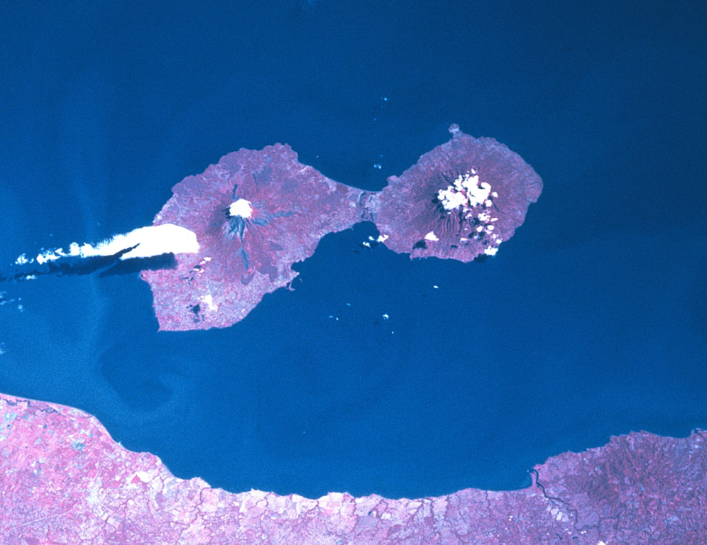 The dumbbell-shaped island of Ometepe, the largest in Lake Nicaragua (also known as Colcibolca), consists of two large stratovolcanoes, Concepción on the left and Maderas on the right.  The two volcanoes were constructed on an unstable substrate of Tertiary-to-Cretaceous marine rocks and younger lake sediments, which has promoted spreading and deformation of the volcanic edifices.  A low narrow isthmus connects Concepción to Maderas volcano.  North lies to the upper left in this Space Shuttle image. NASA Space Shuttle image STS081-742-25, 1997 (http://eol.jsc.nasa.gov/).