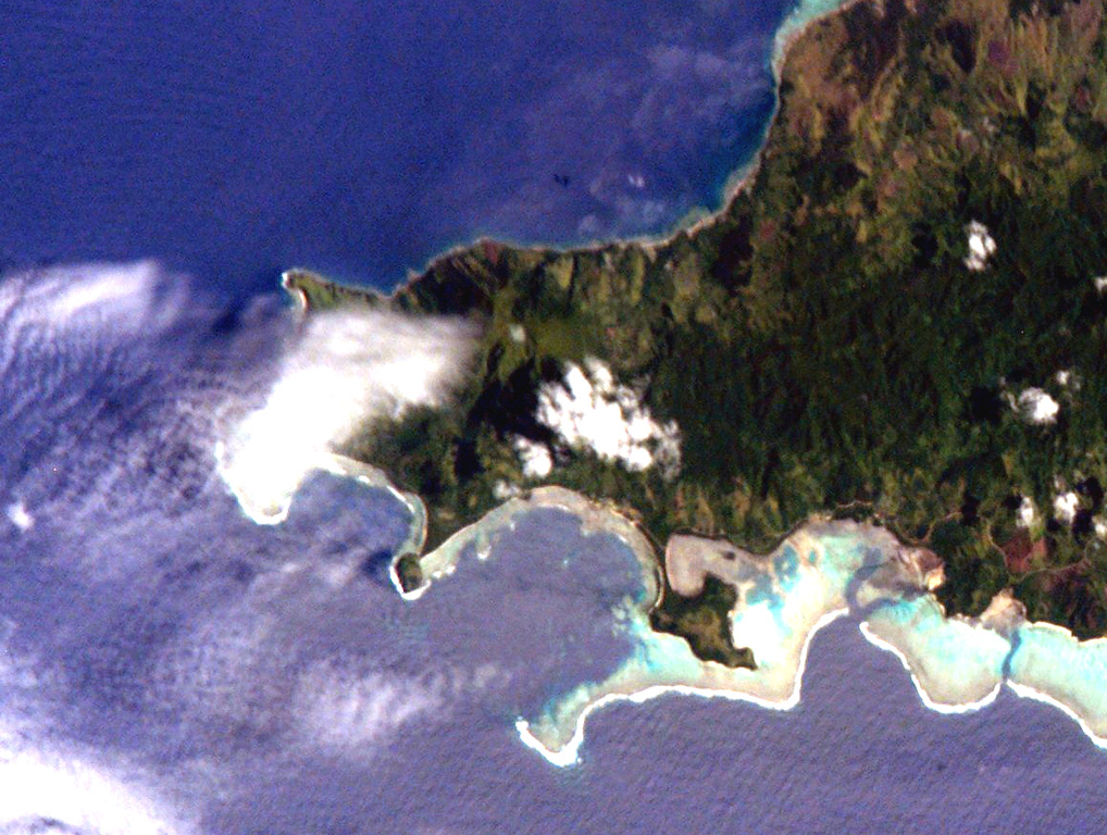 The summit of Nabukelevu lies between the two clouds near the center of this NASA International Space Station image and is located at the SW end of Kadavu Island at the southern end of the Fiji archipelago. Debris avalanches from collapse of the Mt. Washington lava dome complex reached both the northern coast to the right of Cape Washington (the small peninsula at the upper left) and horseshoe-shaped Daviqele Bay (bottom center) and the south. Block-and-ash flows from dome growth and collapse have occurred within the past few hundred years. NASA International Space Station image ISS006-E-7466, 2002 (http://eol.jsc.nasa.gov/).