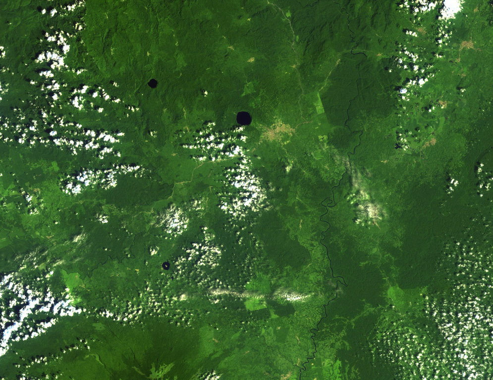 Three lake-filled maars dot the Tombel Graben between Mount Cameroon (lower left) and lava flows from Manengouba volcano (top). The Mungo River runs from N to S across the right side of this Landsat image. The largest maar, Barombi Mbo, lies just west of the brown-colored area of the town of Kumba, and Barombi Koto is at the lower left. A large number of scoria cones, including the young cone of Le Djungo (Mont Pelé) dot the 10-20 km wide graben. NASA Landsat image, 1999 (courtesy of Hawaii Synergy Project, Univ. of Hawaii Institute of Geophysics & Planetology).