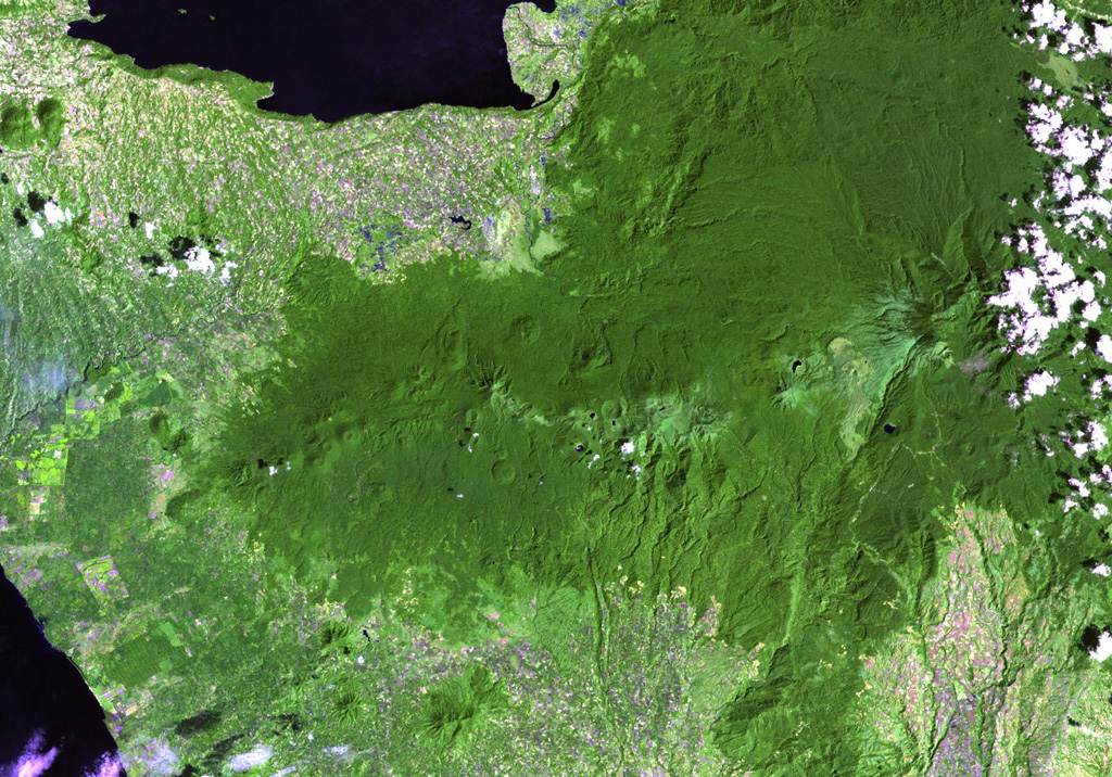 Several prominent pyroclastic cones are visible on the flanks of Makaturing volcano (left of center), located NE of Illana Bay (lower left) and south of Lake Lanao (upper left) at the west end of a chain of volcanoes in central Mindanao. Eruptions from this volcanic chain have variously been attributed to Makaturing and the historically active Ragang. NASA Landsat image, 2003 (courtesy of Hawaii Synergy Project, Univ. of Hawaii Institute of Geophysics & Planetology).