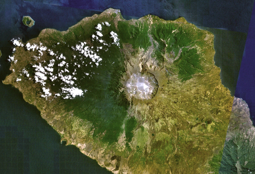 Tambora volcano on Indonesia's Sumbawa Island produced of the world's largest historical eruption in April 1815. This NASA Landsat mosaic shows the 6-km-wide caldera at the top of the 2,850-m-high summit. Pyroclastic flows during the 1815 eruption reached the sea on all sides of the 60-km-wide volcanic peninsula, and the ejection of large amounts of volcanic gas (aerosols) caused world-wide temperature declines in 1815 and 1816. NASA Landsat 7 image (worldwind.arc.nasa.gov)