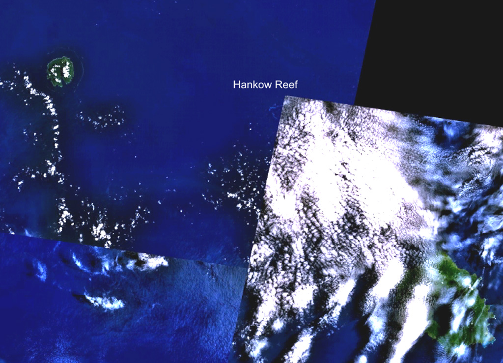 Hankow Reef is partially truncated just below the upper left corner of the cloud-covered portion of this NASA Landsat composite image (with north to the top). The possible existence of a now-submerged volcano named Yomba off the coast of Papua New Guinea is inferred from oral tradition and is considered to likely be at the location of Hankow Reef. The reef lies SE of Bagabag Island (upper left) and NW of Long Island, the larger island at the lower right. Crown Island lies beneath the cloud cover between Long Island and Hankow Reef. NASA Landsat 7 image (worldwind.arc.nasa.gov)