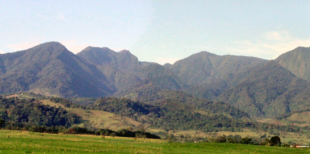 The Viejo-Porvenir complex is seen here rising above farmlands NE of the massif. The Viejo peak is on the left and Porvenir on the right. Photo by Eliecer Duarte (OVSICORI-UNA).