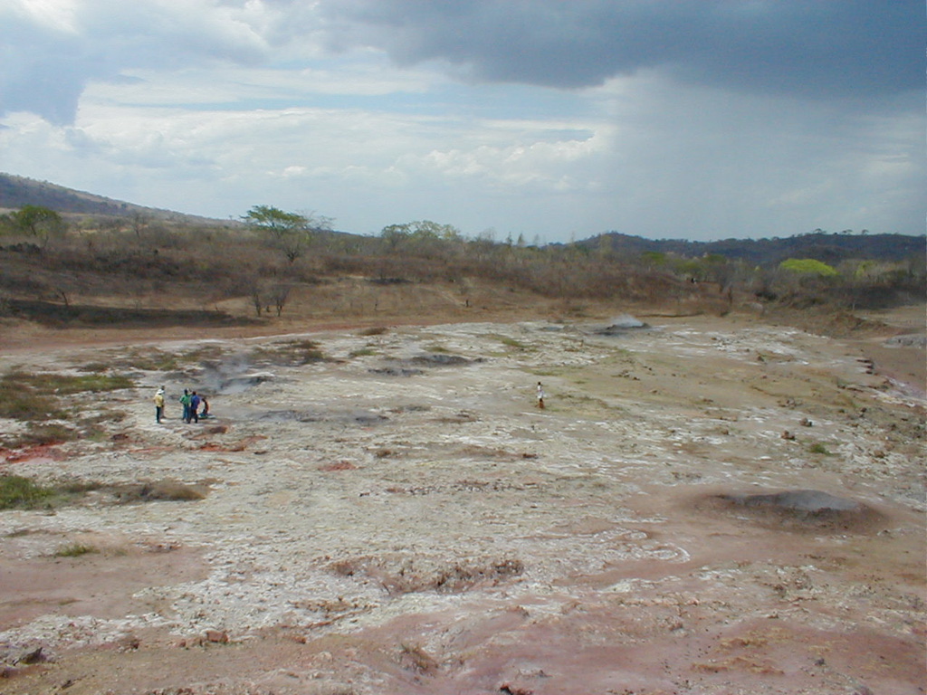 Mudpots and fumaroles mark the San Jacinto - Tizate geothermal area on the NE side of the Telica volcanic complex, the first geothermal power facility in Nicaragua to be fully developed by the private sector.  Feasibility studies suggest possible power generation of 173-240 MW.  Inauguration and reliability testing of the first 10 MW of power generation began in June 2005. Photo by Eliecer Duarte, 2002 (OVSICORI-UNA).