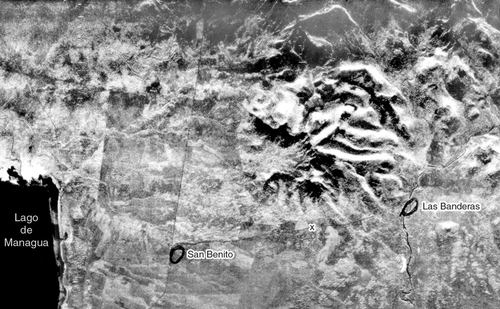 Cerro San Jacinto, a stratovolcano constructed along the eastern margin of the Nicaraguan central graben east of Lake Managua (lower left), is seen at the center of this radar image.  A large central depression at San Jacinto (also known as San Jacinto Viejo) is widely breached to the west.  Lava flows and pyroclastic beds within the walls of the depression dip away from its center.  The towns of San Benito and Las Banderas are circled.   Radar image, 1971 (courtesy of Jaime Incer).