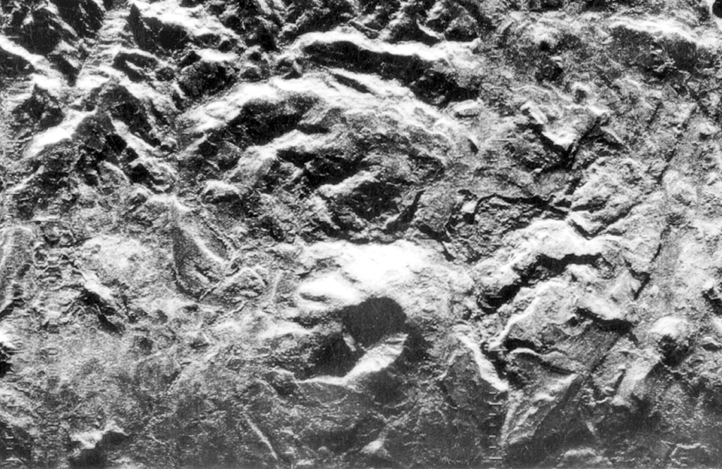 The stratovolcano at the lower center of this radar image is Cerro el Ciguatepe, one of several Quaternary volcanoes that lie in the Nicaraguan interior highlands.  A well-preserved 1.5-km-wide crater is breached to the SW and partially filled by a blocky plug dome.  The steep-sided stratovolcano was constructed at the boundary of flat-lying Tertiary ignimbrite deposits and fault-blocks bordering the Nicaraguan depression.   Radar image, 1971 (courtesy of Jaime Incer).