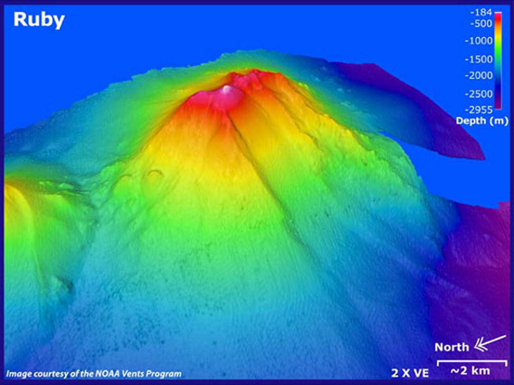 Ruby submarine volcano in the southern Mariana arc is seen in this bathymetric data looking from the NW with 2x vertical exaggeration. Depths in this image range from 184 to 2,955 m, and it rises to within 230 m of the ocean surface NW of Saipan. There was an eruption detected in 1966 by sonar signals. In 1995 submarine explosions were heard, accompanied by a fish kill, sulfurous odors, bubbling water, and the detection of volcanic tremor. Image courtesy of Susan Merle (Oregon State University/NOAA Vents Program).