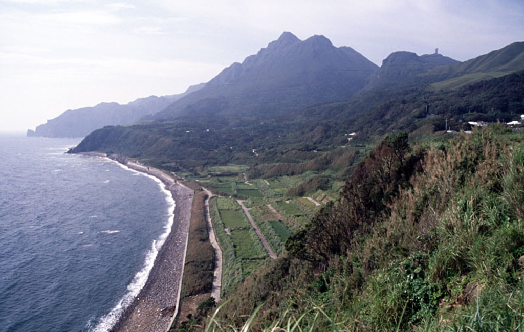 The center peak is the Maedake lava dome that rises above the E coast of Kuchinoshima and forms the high point of the island. The flat-topped Yokodake peak is to the upper right. Kuchinoshima lies in the northern Ryukyu Islands between the volcanic islands of Nakanoshima and Kuchinoerabujima. Copyrighted photo by Shun Nakano, 2005 (Japanese Quaternary Volcanoes database, RIODB, http://riodb02.ibase.aist.go.jp/strata/VOL_JP/EN/index.htm and Geol Surv Japan, AIST, http://www.gsj.jp/).