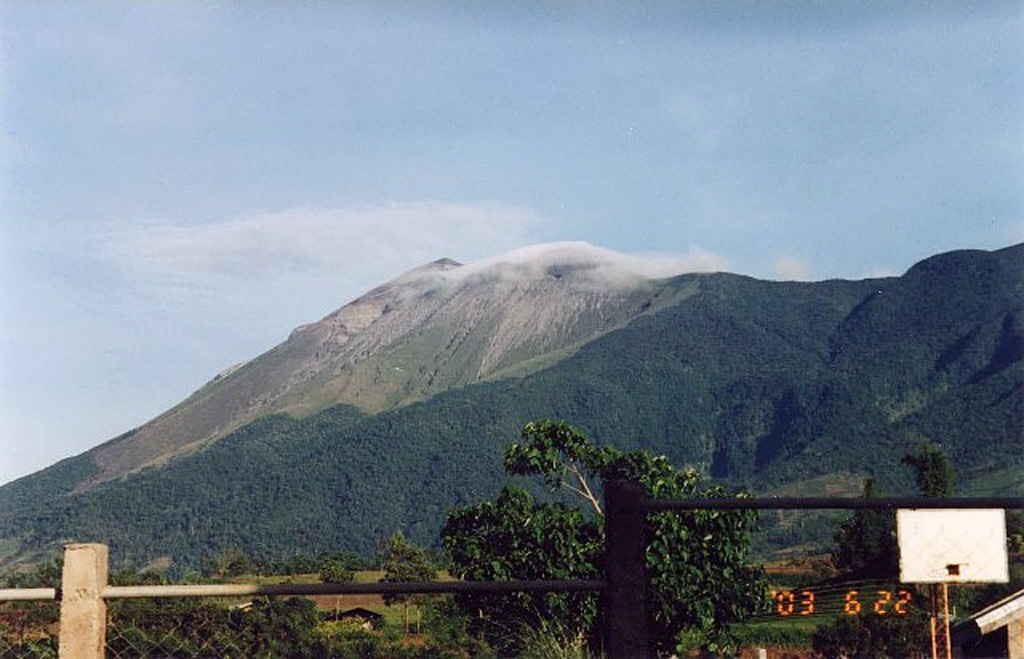 Meteorological clouds drape the sparsely vegetated summit of Kanlaon, the most active volcano of the central Philippines and the highest point of Negros Island. It contains different cones and craters, many of which are filled by lakes. Historical eruptions, recorded since 1866, have typically consisted of small-to-moderate phreatic explosions that produce minor ashfall near the volcano. Photo courtesy of PHIVOLCS.