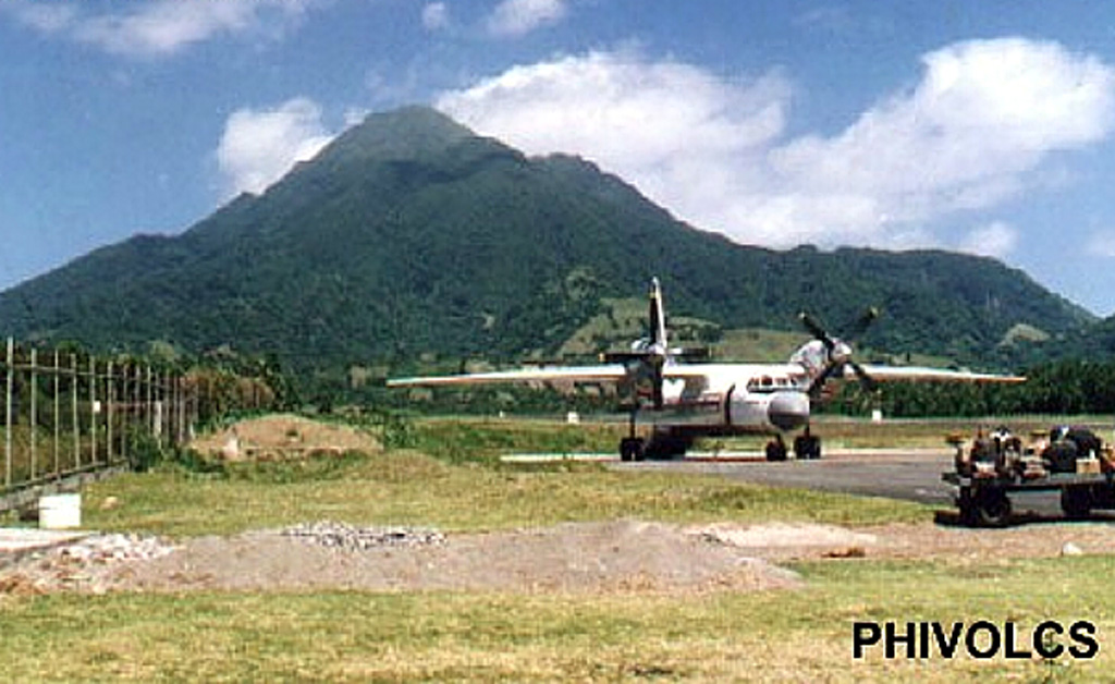 Iraya rises above the airport on Batan Island and is the northernmost active volcano in the Philippines. It has a 1.5-km-wide summit crater, which is largely filled by a younger cone that forms the summit. A pyroclastic flow deposit was radiocarbon dated at about 1,500 years ago and a historical eruption was reported in 1454 CE. Photo courtesy of PHIVOLCS.