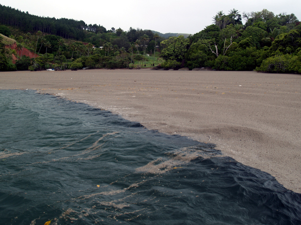 Floating pumice partially fills North Bay along the southern coast of Kadavu, Fiji, on 30 September 2006. This photo was taken about seven weeks after a submarine eruption began on 7 August at Home Reef, in the Tonga Islands. Wide tracks of floating pumice extended across the SW Pacific, and by March and April of 2007 had washed up along a 1,300-km-long stretch of the eastern Australian coast. Photo by Roger Matthews, 2006 (published in GVN Bulletin).