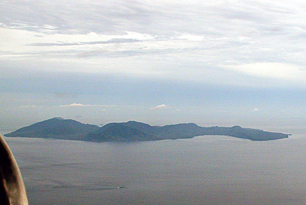 The elongated island of Pulau Weh is offshore from the NW tip of Sumatra. It has been interpreted as the remains of a partially-collapsed older volcanic center that now opens to the NW and is filled by the sea. Volcanism at Pulau Weh was considered to be of Pleistocene age, but fumaroles and hot springs are present along a NW-E-trending line along the summit of the island and near the western shore of Lhok Perialakot bay on the northern side of the island. Copyrighted photo by Michael Thirnbeck, 2006.