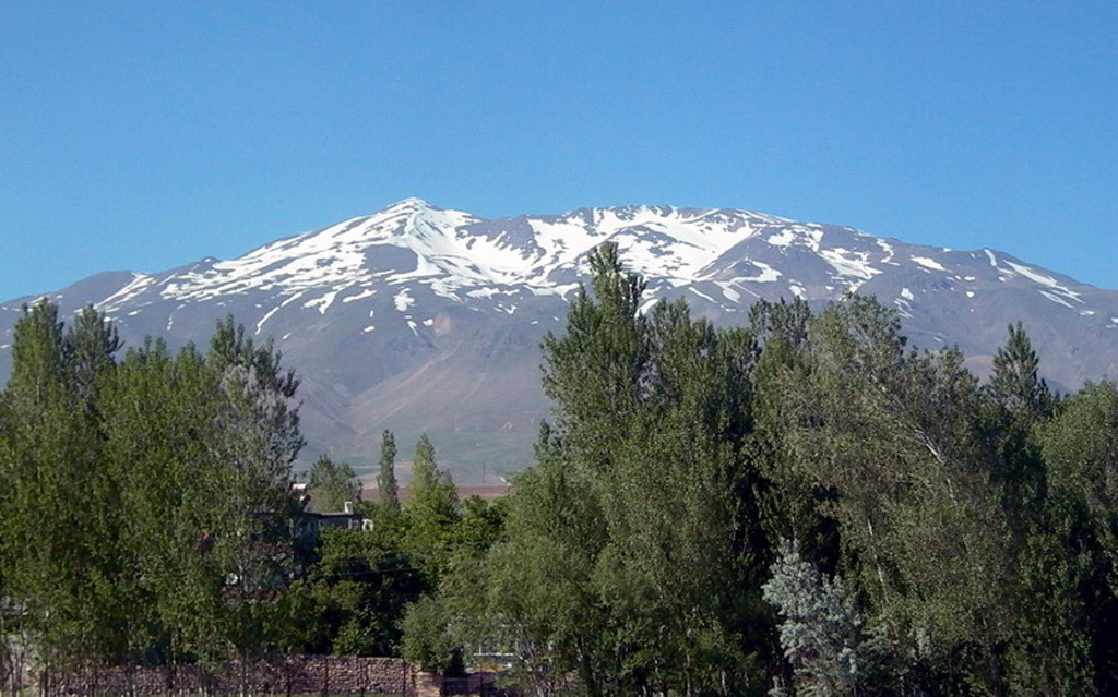 Snow-capped Süphan Dagi lies immediately north of Lake Van. A large lava dome was constructed over the central vent, and the flanks of the volcano contain numerous lava domes and cones that erupted along radial and circumferential fissures. Photo by Murat Erdogan, 2005 (http://en.wikipedia.org/wiki/Image:Suphan_Dagi.jpg).