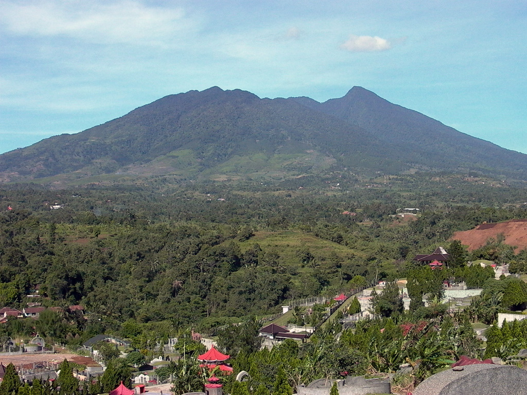 Two large breached craters truncate the summit of Gunung Salak. Historical eruptions from have consisted of phreatic explosions from craters on the western flank. Salak volcano has been the site of extensive geothermal exploration. Photo by Cahya Patria, 2005 (Centre of Volcanology & Geological Hazard Mitigation, Volcanological Survey of Indonesia).