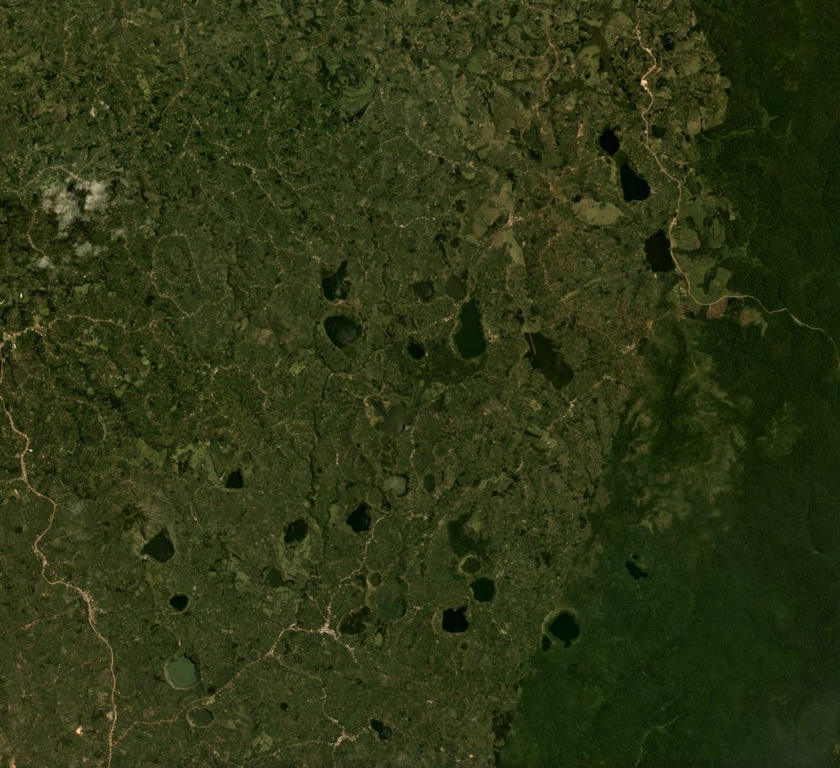 The lakes visible in this April 2019 Planet Labs satellite image mosaic (N at the top) formed within craters of the Kyatwa volcanic field between Lake Albert and Lake Edward in Uganda. Satellite image courtesy of Planet Labs Inc., 2019 (https://www.planet.com/).