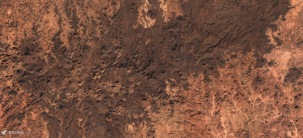 The 2,150 km2 Atakor Volcanic Field within the Hoggar volcanic province, Algeria, contains abundant scoria cones, lava domes, and lava flows, seen across this 15 November 2019 Sentinel-2 satellite image (N at the top). Erosion has also exposed intrusions and volcanic conduits from older activity. Satellite image courtesy of Copernicus Sentinel Data, 2019.