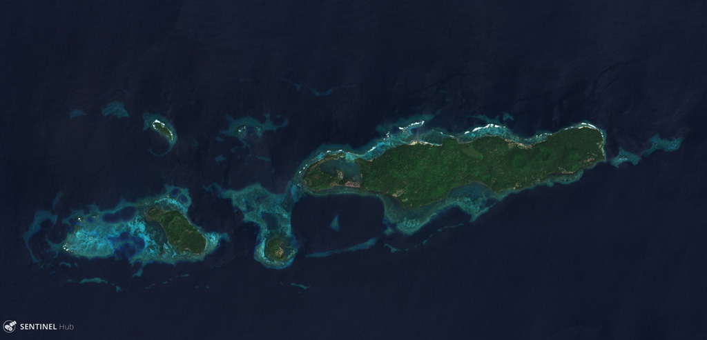 The Mundua islands are an E-W trending group of volcanic edifices north of New Britain, Papua New Guinea. The island group is seen here in a 4 December 2019 Sentinel-2 satellite image (N at the top) with a lateral distance of approximately 15 km. The largest island to the E is Ningau, with Goru crater on the far left side. Three smaller island-forming cones can be seen to the W of Ningau, with Silenge, then Vambu from E to W, and Undaga N of Vambu. Satellite image courtesy of Copernicus Sentinel Data, 2019.