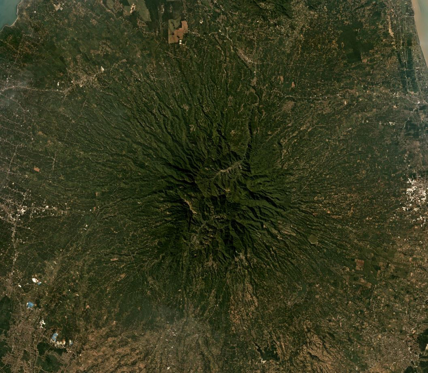 Muria forms the Muria Peninsula along the northern coast of central Java, further north of the main Sunda arc volcanoes in Java. Seen here in this June 2019 Planet Labs satellite image mosaic (N is at the top), the edifice is extensively eroded, and 12 maars have been identified around the main cone. Satellite image courtesy of Planet Labs Inc., 2019 (https://www.planet.com/).