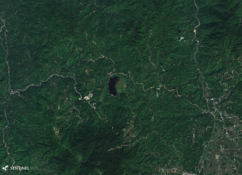 The 1.8-km-long (N-S) arcuate lake in the center of this 15 November 2019 Sentinel-2 satellite image (N is at the top) is Lake Leonard, located within a caldera of the Leonard Range in Mindanao Island. Around the lake are a series of lava domes and active geothermal areas. Satellite image courtesy of Copernicus Sentinel Data, 2019.
