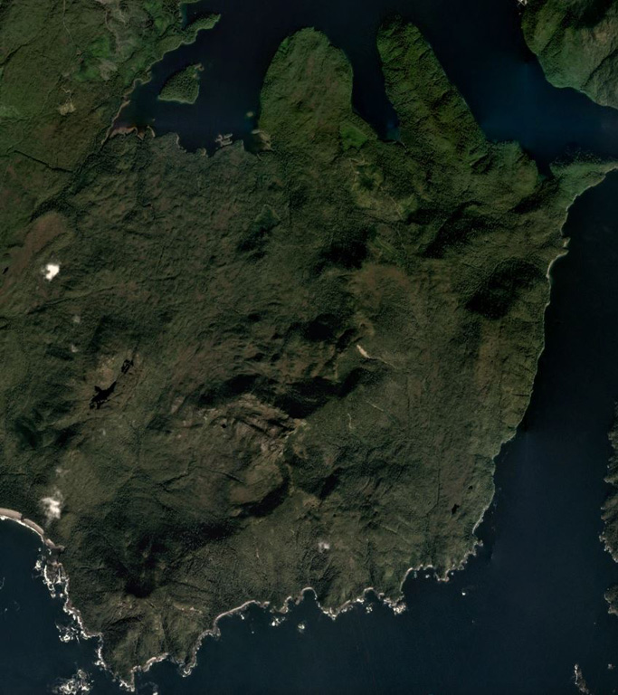 Lava flows of the Tlevak Strait-Suemez Island volcanic group are located near Tlevak Strait (lower right) and on the SW end of Suemez Island.  The largest deposits are located north of Trocadero Bay, the large embayment on the southern side of Suemez Island. Satellite image courtesy of Planet Labs Inc., 2019 (https://www.planet.com/).