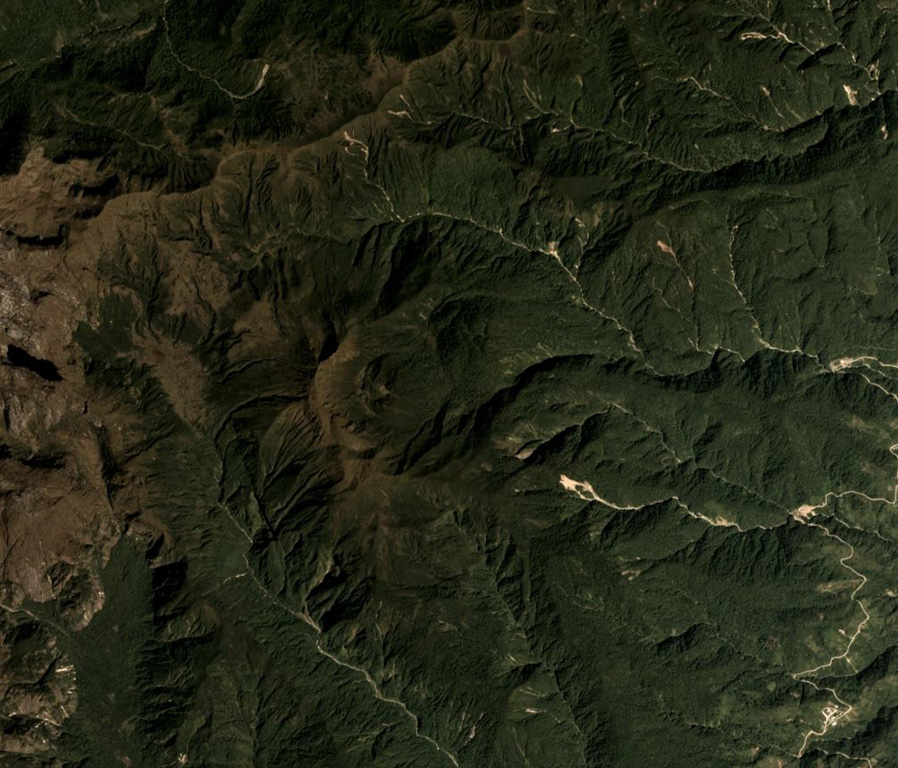 Volcán el Soche is a small volcano near the Ecuador-Colombia border and is seen in the center of this December 2017 Planet Labs satellite image monthly mosaic (N is at the top; this image is approximately 9.5 km across).  Soche is the northernmost of a chain of Ecuadorian volcanoes east of the principal volcanic axis and was the source of a major explosive eruption during the early Holocene. Satellite image courtesy of Planet Labs Inc., 2018 (https://www.planet.com/).