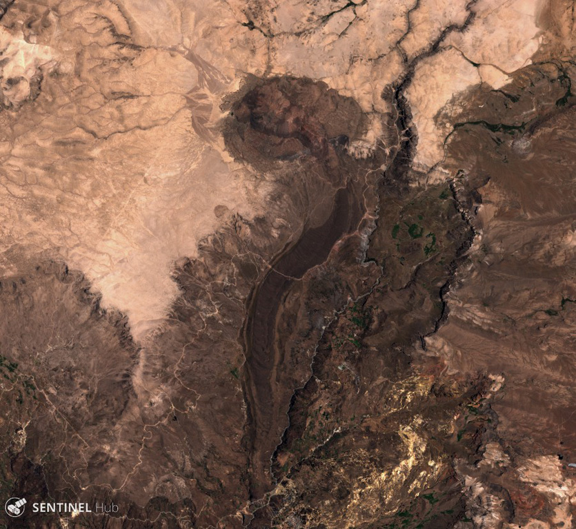 The lava flow down the center of this 3 December 2019 Sentinel-2 satellite image (N is at the top) was erupted from the Cerro Auquihuato scoria cone at its northern terminus. The flow is approximately 10 km long and reaches a thickness of 50 m. Satellite image courtesy of Copernicus Sentinel Data, 2019.