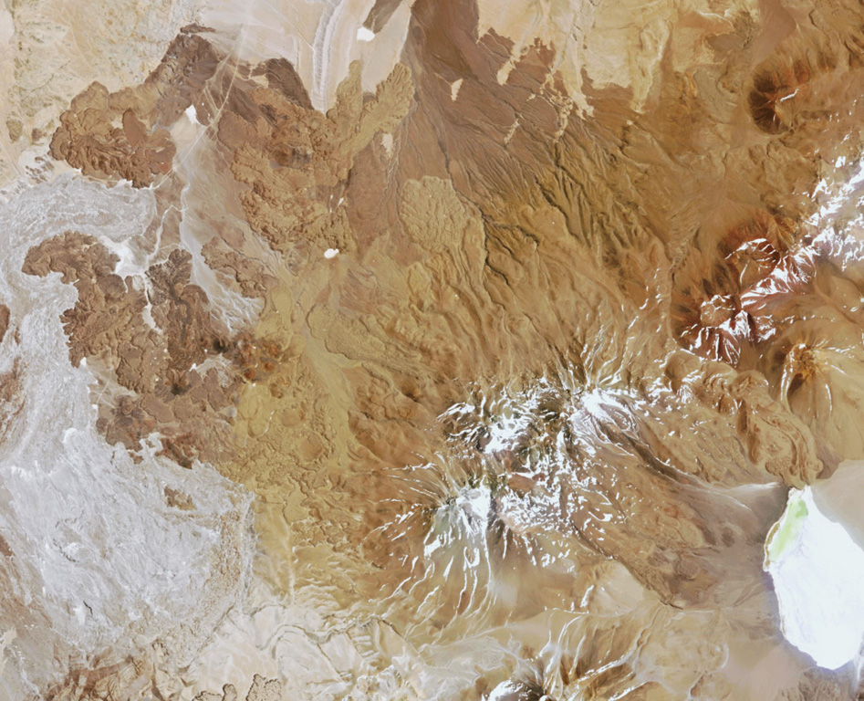 Pular is the 12-km-long volcanic ridge below the center of this 29 October 2018 Planet Scope image (N is at the top; this image is approximately 41 km across). The lava flows to the W are at El Negrillar. The edifice contains Cerro Pular at the NE end and Cerro Pajonales at the SW. Satellite image courtesy of Planet Labs Inc., 2018 (https://www.planet.com/).