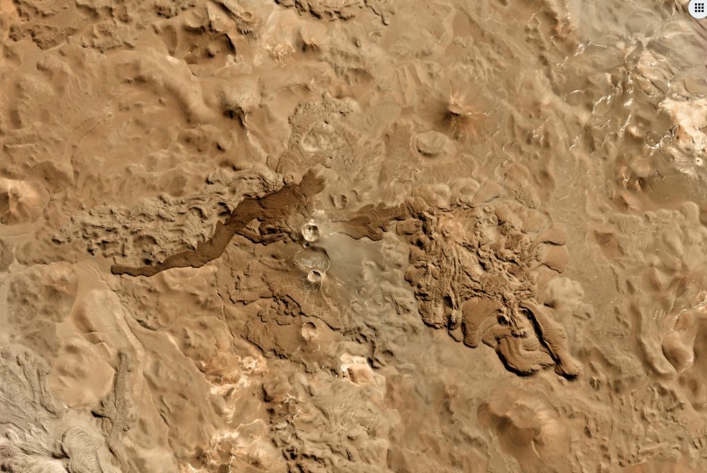 Cordón del Azufre is in the center of this 22 May 2019 Planet Scope satellite image (N is at the top), located along the Chile-Argentina border. The darker lava flow originated from Volcán la Moyra, the youngest feature of the volcanic field, reaching 6 km to the W. The complex includes a N-S chain of four craters and numerous lava flows. Satellite image courtesy of Planet Labs Inc., 2019 (https://www.planet.com/).