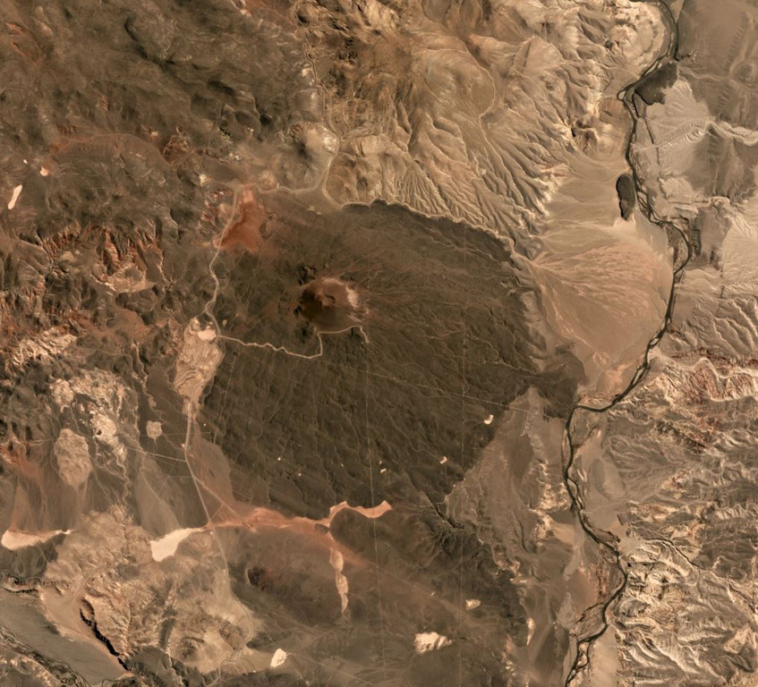 The Cochiquito Volcanic Group includes this scoria cone and lava field, seen in this October 2019 Planet Labs satellite image monthly mosaic (N is at the top). The N-S length of this lava field is approximately 7 km and the crater is approximately 250 m in diameter. Satellite image courtesy of Planet Labs Inc., 2019 (https://www.planet.com/).