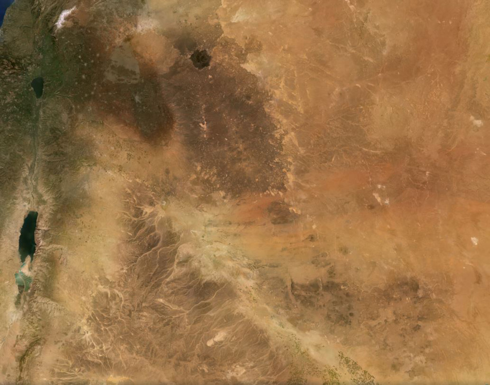 The 100,000 km2 Harrat Ash Shaam volcanic field extends from the NW corner to the SE corner of this February 2021 Planet Labs satellite image monthly mosaic (N is at the top; this image is approximately 480 km across). The Harrat contains several volcanic fields including Al Harrah, Jabal ad Druze, Es Safa, Golan Heights, and the Kra Lava Field. Satellite image courtesy of Planet Labs Inc., 2021 (https://www.planet.com/).