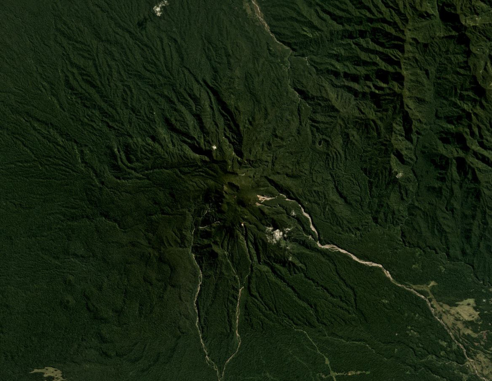 Mount Victory in Cape Nelson, Papua New Guinea, is shown in this July 2018 Planet Labs satellite image monthly mosaic (N is at the top; this image is approximately 20 km across). The vegetated flanks are eroded and four scoria cones are on the lower SW flank with several craters visible. The summit contains an irregular crater and there are two more cones on the NE flank. Satellite image courtesy of Planet Labs Inc., 2018 (https://www.planet.com/).