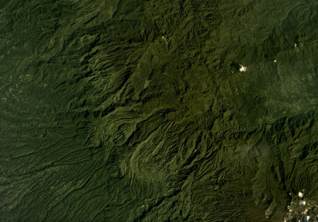 Lava flow morphologies are visible on the eroded, vegetated, flanks of Tore in NW Bougainville Island, Papua New Guinea, in this December 2019 Planet Labs satellite image monthly mosaic (N is at the top; this image is approximately 22 km across). The NW flank of Balbi volcano is in the lower right of this image. Satellite image courtesy of Planet Labs Inc., 2019 (https://www.planet.com/).