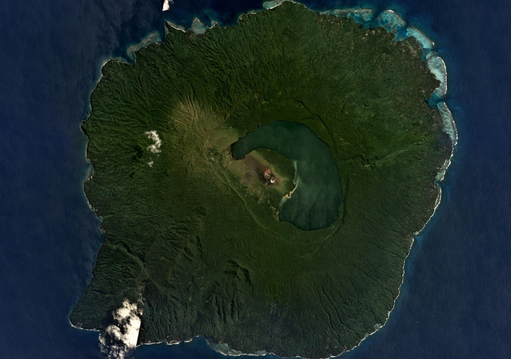 The 40-km-wide volcanic Guaya Island contains Lake Letas within a 6 x 8 km caldera in the center of this  September 2019 Planet Labs satellite image monthly mosaic (N is at the top). The active Mount Garet formed within the caldera and has two summit craters; explosive eruptive activity occurred from the SE crater in 2009-2010. Smaller cones and lava flows have formed across the flanks. Satellite image courtesy of Planet Labs Inc., 2019 (https://www.planet.com/).