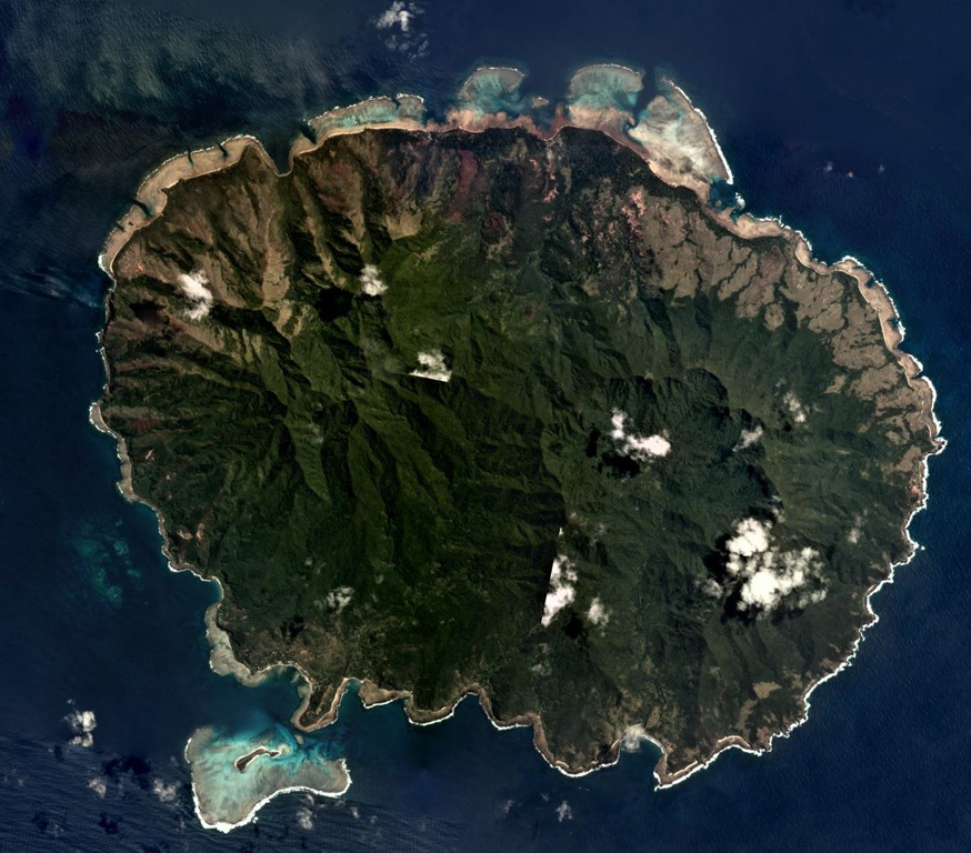 Aneityum Island is approximately 17 km long in the NE-SW direction, shown in this September 2019 Planet Labs satellite image monthly mosaic (N is at the top). Two main eroded edifices form the island, Nanawarez in the E and Inrerow Atamwan to the W, with a large horseshoe-shaped scarp that opens to the SE visible on Nanawarez. Satellite image courtesy of Planet Labs Inc., 2019 (https://www.planet.com/).