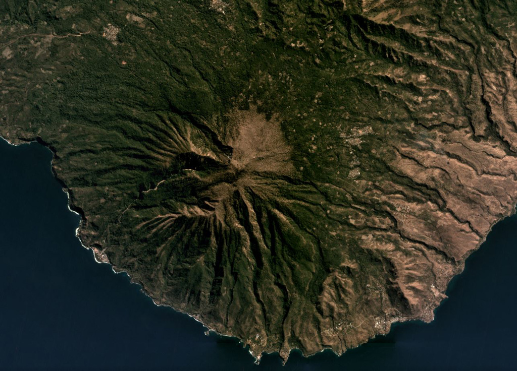 Ililabalekan forms a peninsula in SW Lembata island, seen here in this July 2019 Planet Labs satellite image monthly mosaic (N is at the top; this image is approximately 11 km across). The flanks are extensively eroded and geothermal activity occurs at the summit. Satellite image courtesy of Planet Labs Inc., 2019 (https://www.planet.com/).