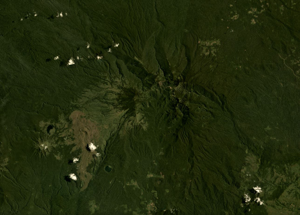 Ragang volcano in central Mindanao is in the center of this  August 2019 Planet Labs satellite image monthly mosaic (N is at the top; this image is approximately 24 km across). Latukan is to the SW, past lava flows with visible levees and pressure ridges that appear to have erupted from flank vents. Satellite image courtesy of Planet Labs Inc., 2019 (https://www.planet.com/).