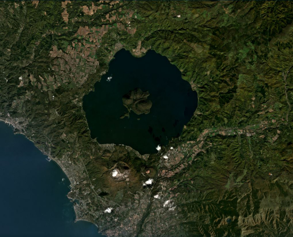 Usu is along the SW boundary of the larger Toya caldera and is shown here in this September 2019 Planet Labs satellite image monthly mosaic (N is at the top). The Usu edifice summit contains the collapse scarp in the center of the image, which is 1.5-2 km across and contains both domes and cryptodomes. Additional cryptodomes surround the scarp from the NW around to the SE. Satellite image courtesy of Planet Labs Inc., 2020 (https://www.planet.com/).