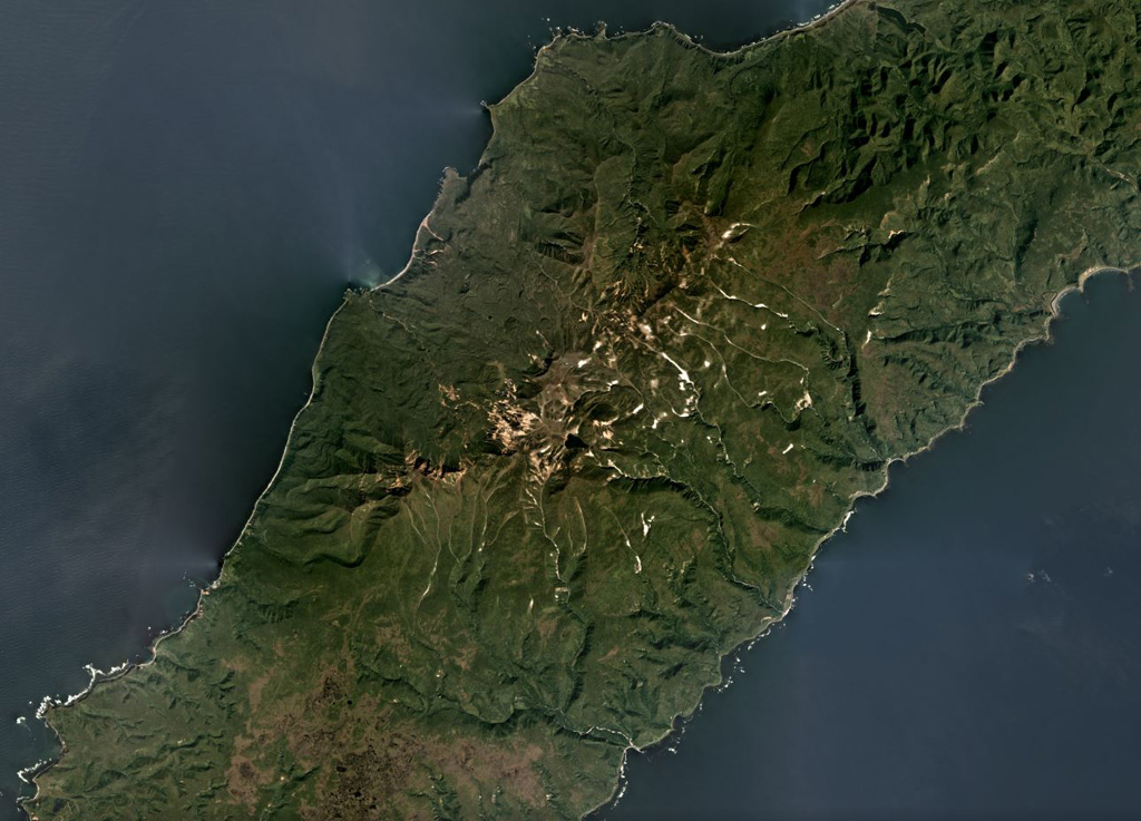 The Ivao Group within the Krishtofovich Ridge has undergone extensive erosion and the remains are mostly lava flows; it is in SW Urup island and contains three remaining cones. The group is in the center of this September 2019 Planet Labs satellite image monthly mosaic (N is at the top; this image is approximately 40 km across). Satellite image courtesy of Planet Labs Inc., 2019 (https://www.planet.com/).