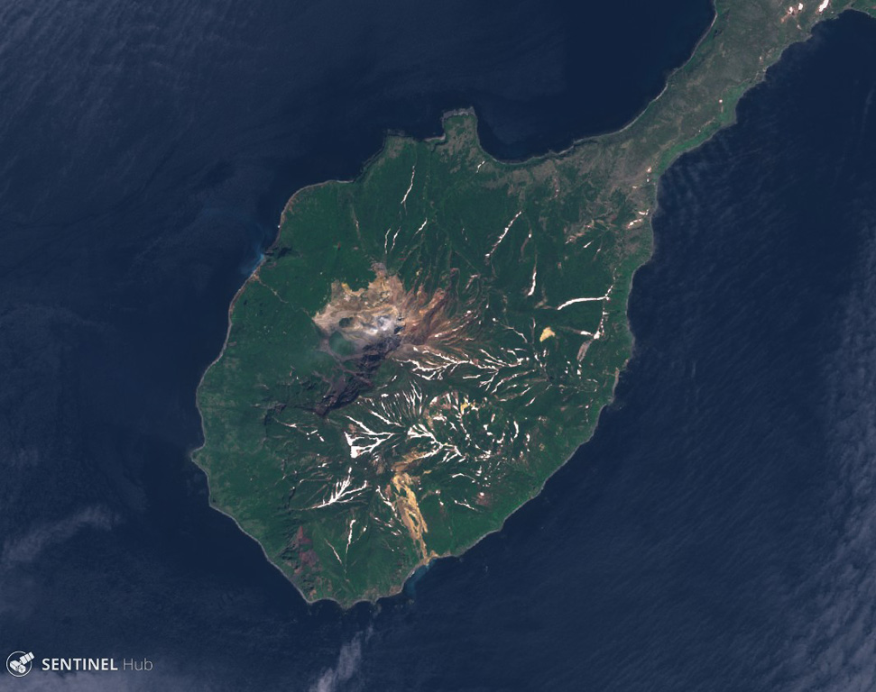 Kuntomintar comprises the southern part of Shiashkotan Island, shown in this June 2020 Planet Labs satellite image monthly mosaic (N is at the top; this image is approximately 8.5 km across). Several Holocene craters are preserved along the summit and geothermal activity occurs within the active crater inside the large scarp that opens to the NW. Satellite image courtesy of Planet Labs Inc., 2019 (https://www.planet.com/).